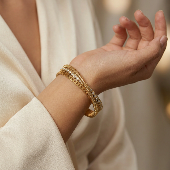 Delemon gold Verona triple layer crossover bangle bracelet with bezel-set crystals and textured rope strands in waterproof 18k gold plated stainless steel