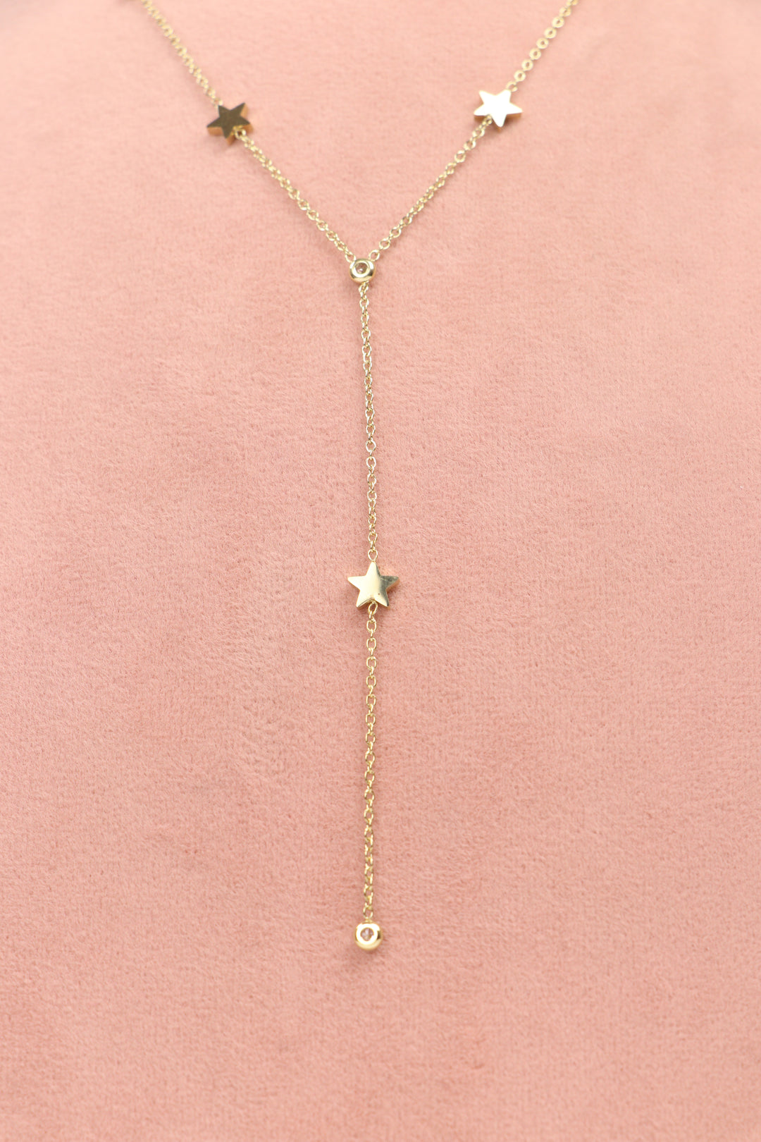 Delemon high-quality gold plated Y-shaped lariat chain necklace featuring star charms and small round crystals front view.