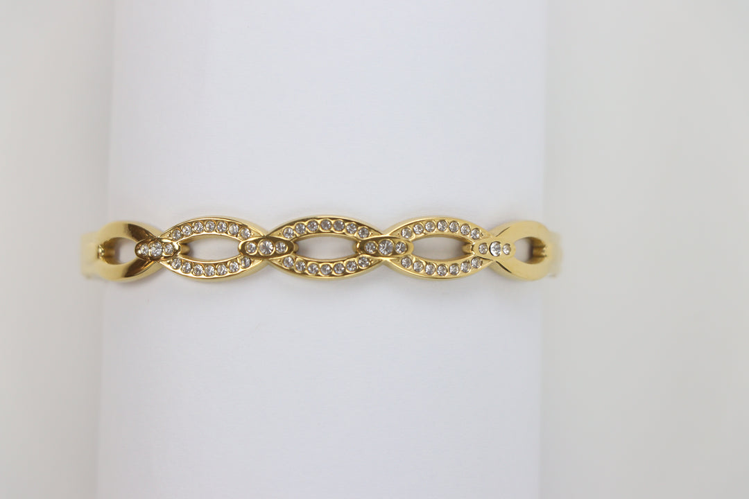 Delemon gold Seraphina infinity loop rigid bangle bracelet with micro-pavé crystal borders in waterproof 18k gold plated stainless steel