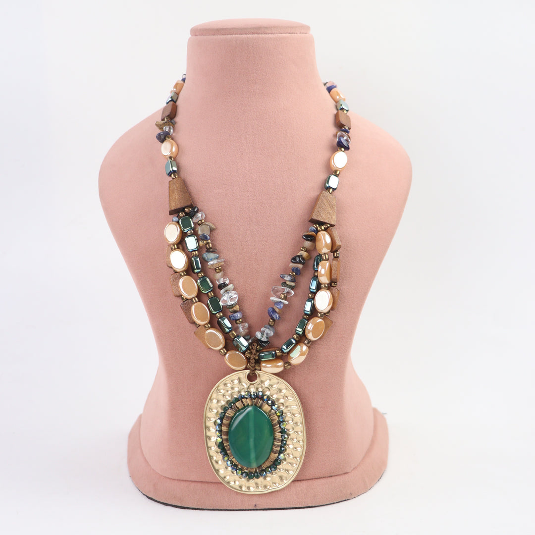 Delemon green cabochon stone on hammered gold oval pendant multi-strand wooden bead necklace