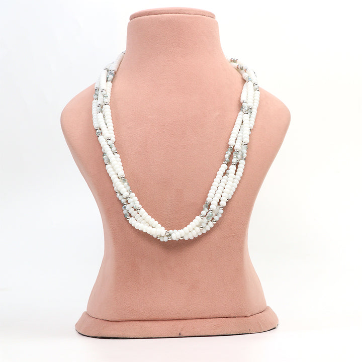 Delemon multi-strand white bead necklace with silver crystal accents.