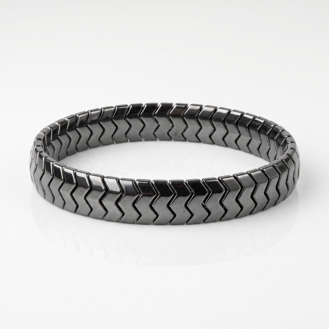 Delemon  featuring a uniform directional stretch bracelet with polished interlocking chevron arrowhead hematite