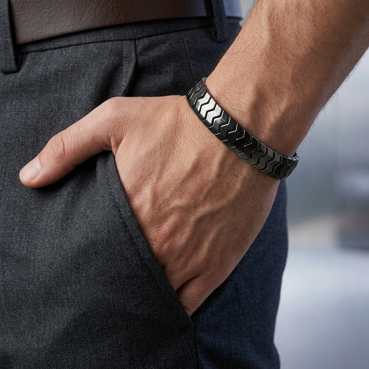 Delemon  featuring a uniform directional stretch bracelet with polished interlocking chevron arrowhead hematite