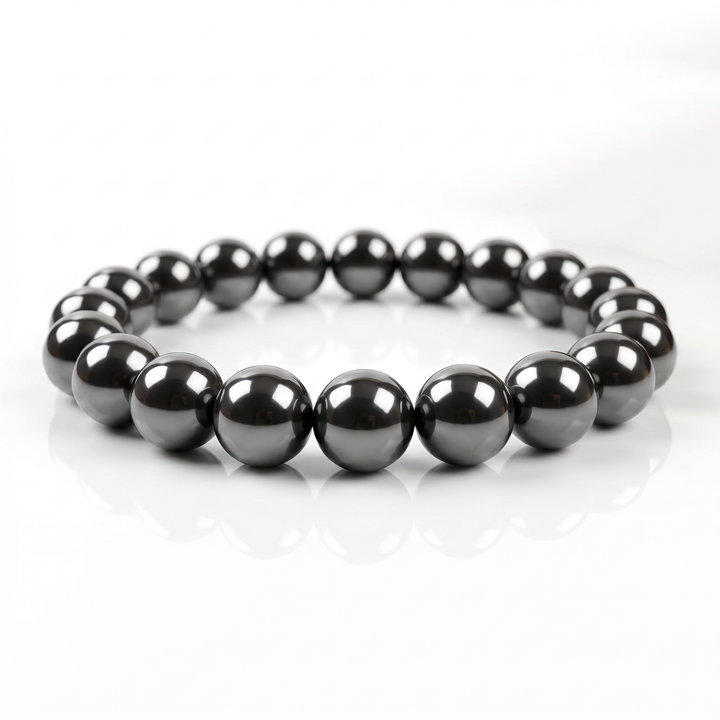Delemon featuring a uniform round spherical hematite bead stretch bracelet with highly polished gunmetal
