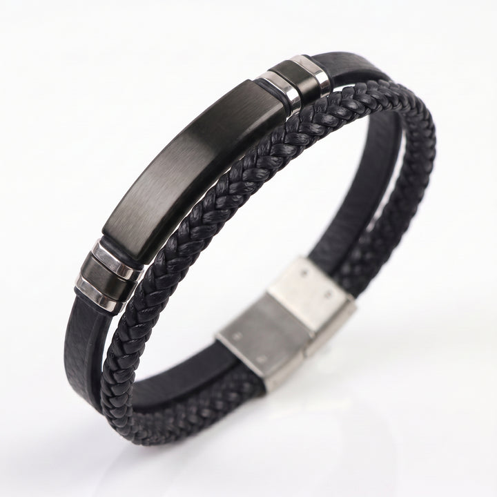Delemon featuring a dual-strand brown leather bracelet with a central matte black stainless steel