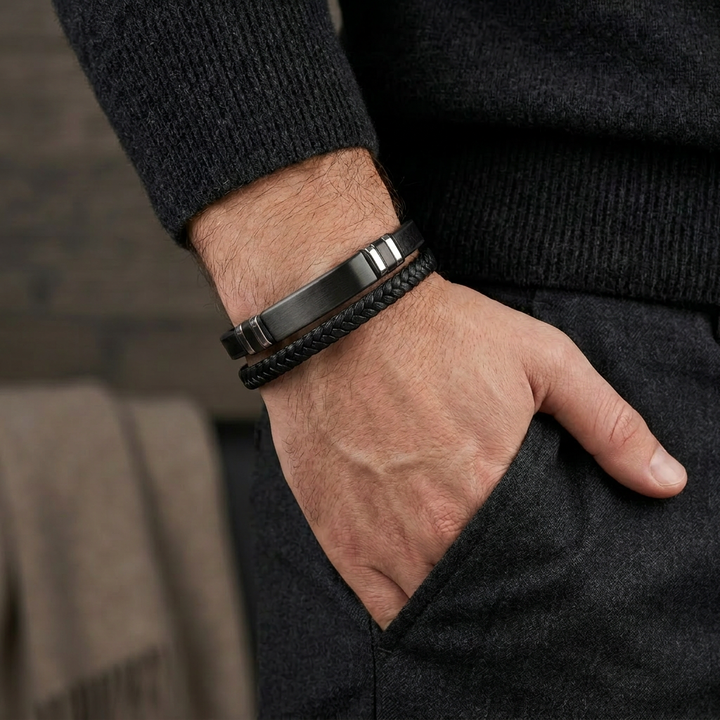 Delemon featuring a dual-strand brown leather bracelet with a central matte black stainless steel