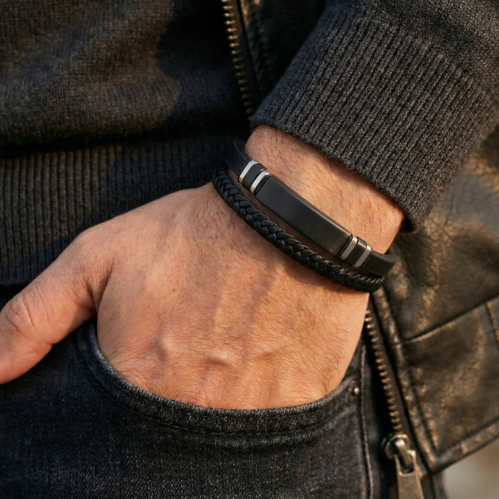 Delemon featuring a dual-strand brown leather bracelet with a central matte black stainless steel