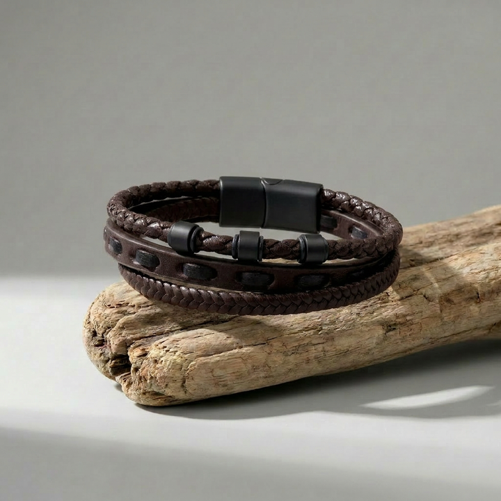 Delemon featuring a pre-stacked multi-strand all-black braided leather bracelet