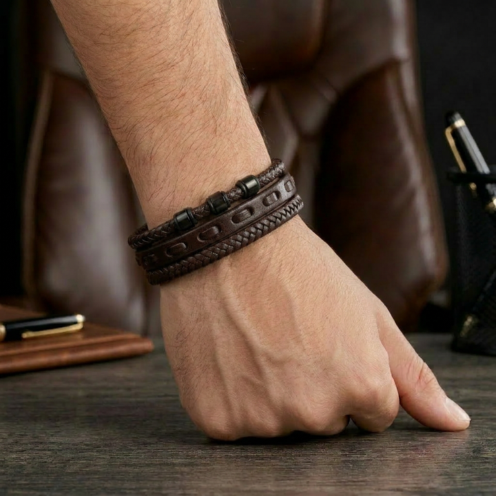 Delemon featuring a pre-stacked multi-strand all-black braided leather bracelet
