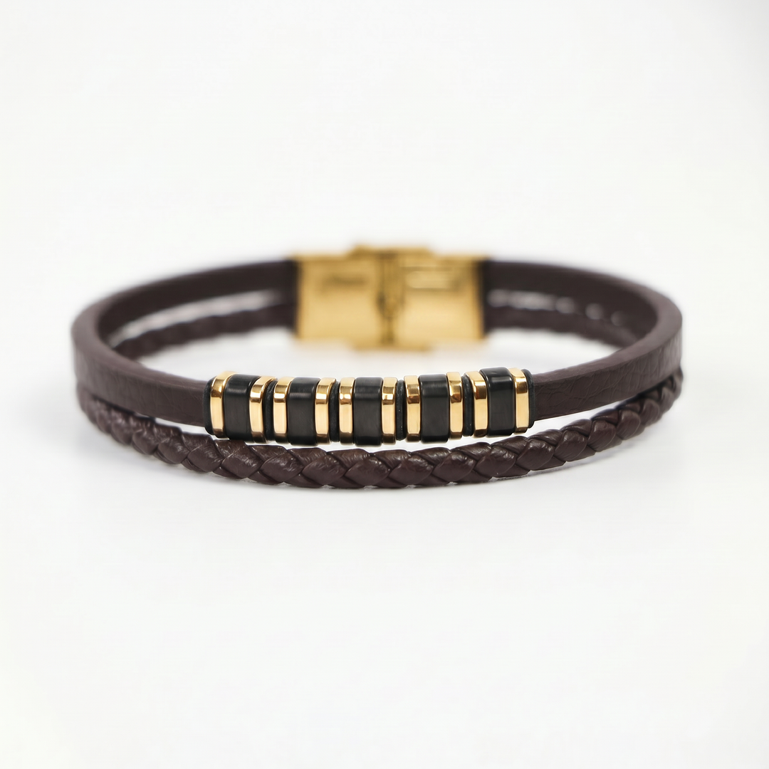 featuring a dual-strand brown leather bracelet with alternating gold and black metal ring