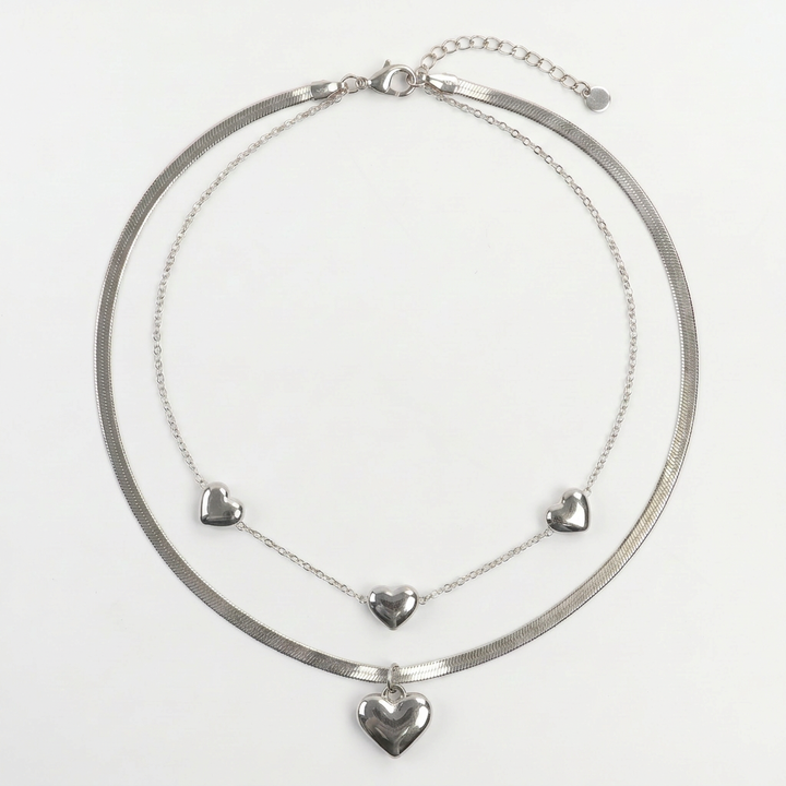 Delemon high-quality silver polished chain necklace featuring multiple delicate heart charms