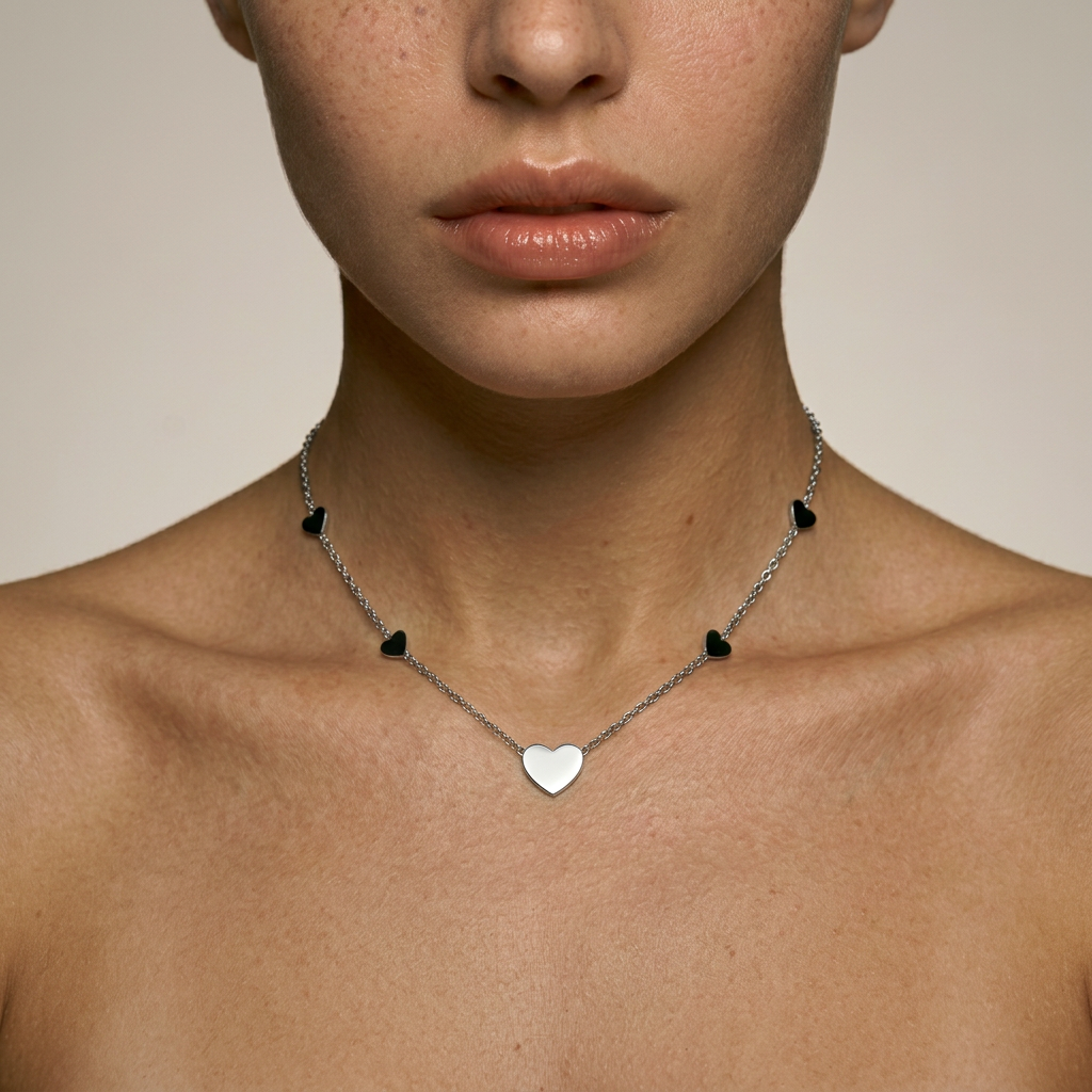 Delemon high-quality silver polished chain necklace featuring multiple delicate heart charms in a station design