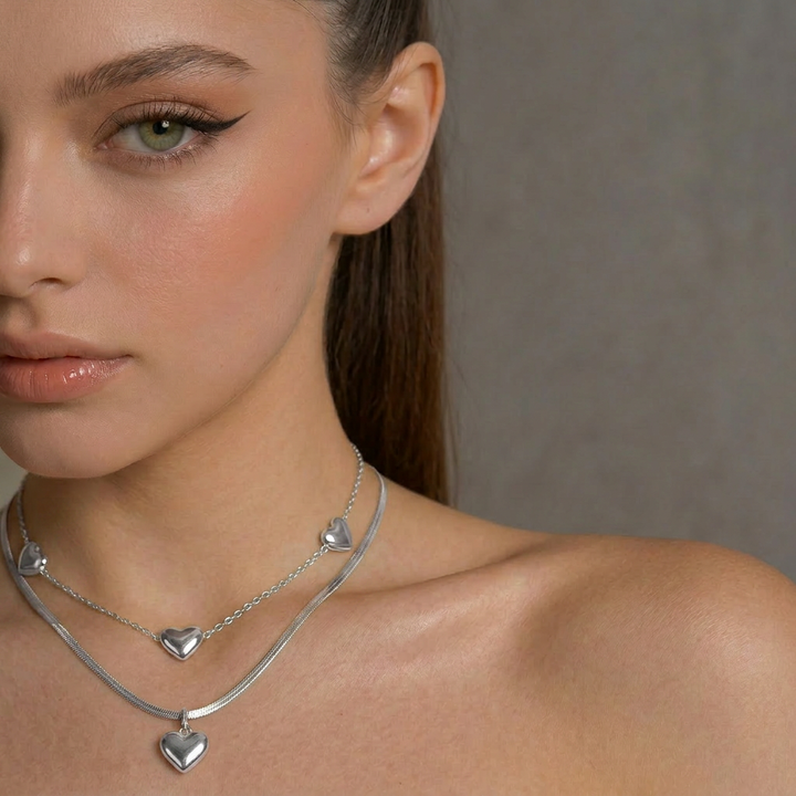 Delemon high-quality silver polished chain necklace featuring multiple delicate heart charms