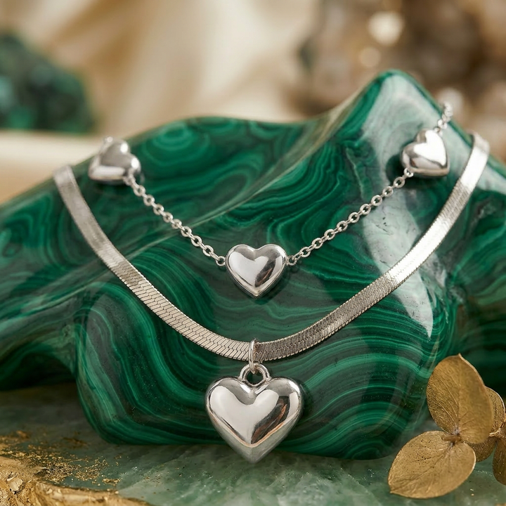 Delemon high-quality silver polished chain necklace featuring multiple delicate heart charms
