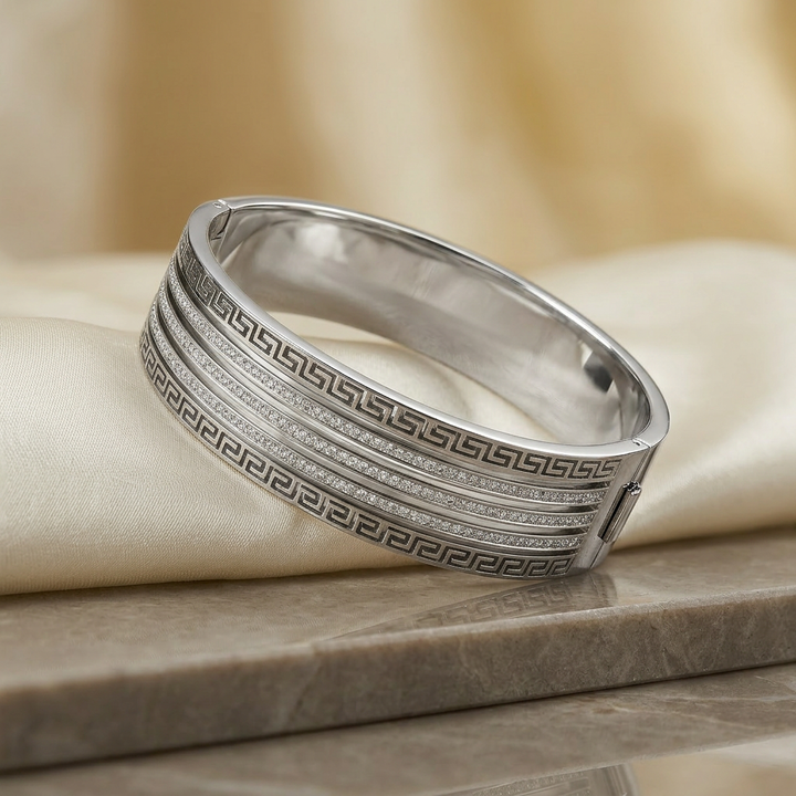 Delemon silver wide-profile Greek key statement cuff bangle bracelet with three rows of clear crystals in waterproof 316L stainless steel