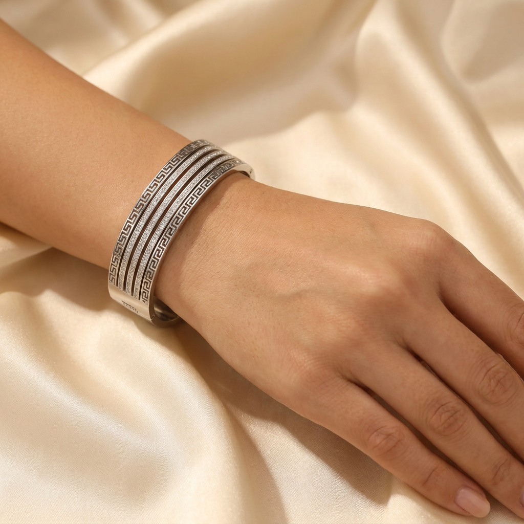 Delemon silver wide-profile Greek key statement cuff bangle bracelet with three rows of clear crystals in waterproof 316L stainless steel