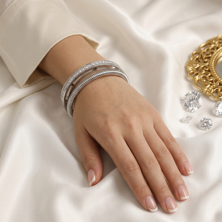 Delemon silver Milan double row layered bangle bracelet with channel-set crystals and a ribbed snake rope strand in waterproof 316L stainless steel