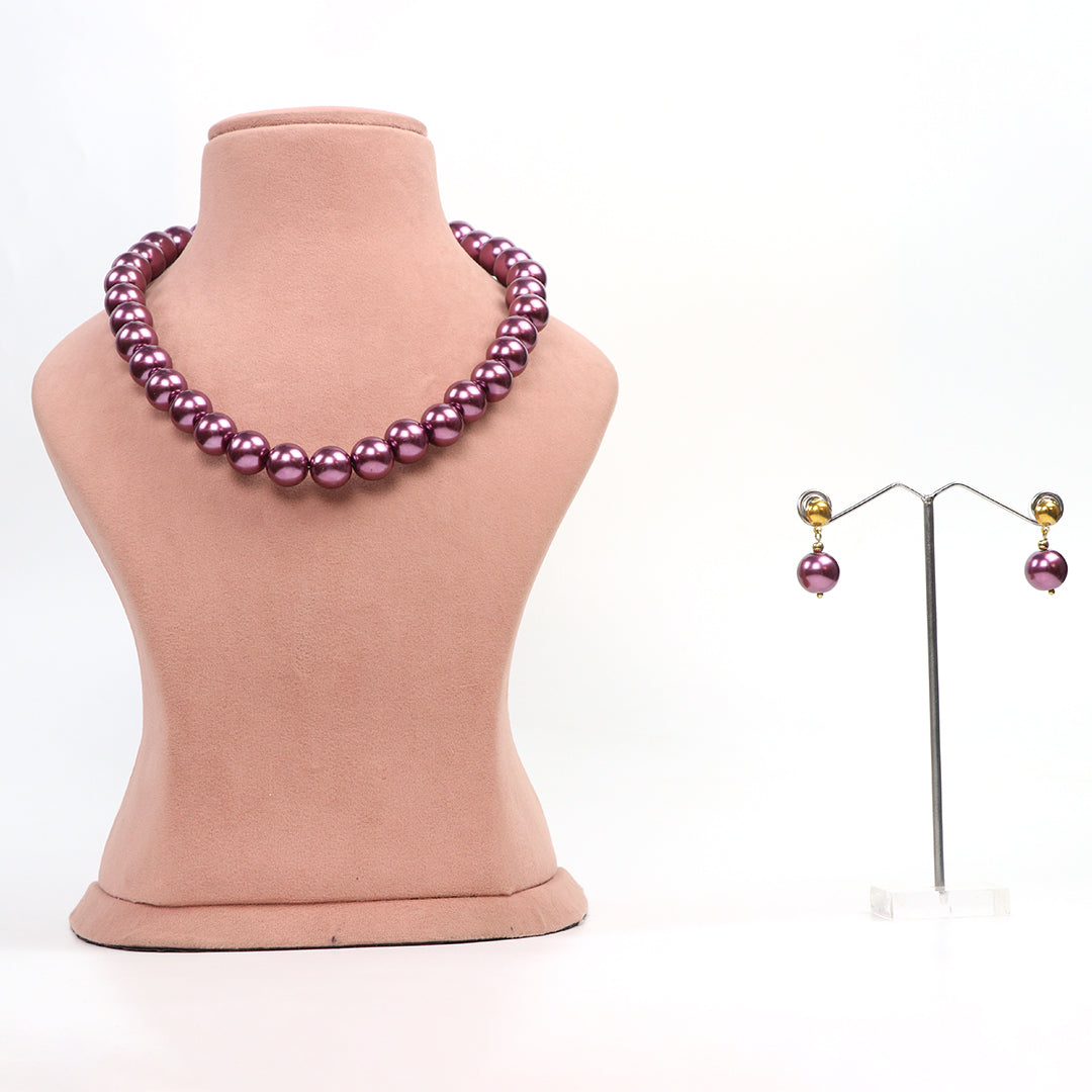 Delemon single-strand purple pearl necklace with matching stud earrings set.