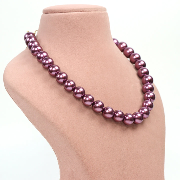 Delemon single-strand purple pearl necklace side view.