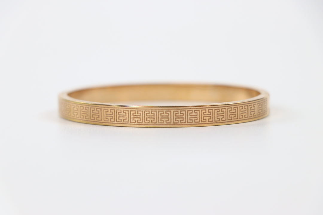 elemon three-piece rigid bangle stack featuring yellow gold, rose gold, and silver Greek key engraved geometric bracelets in waterproof 316L stainless steel