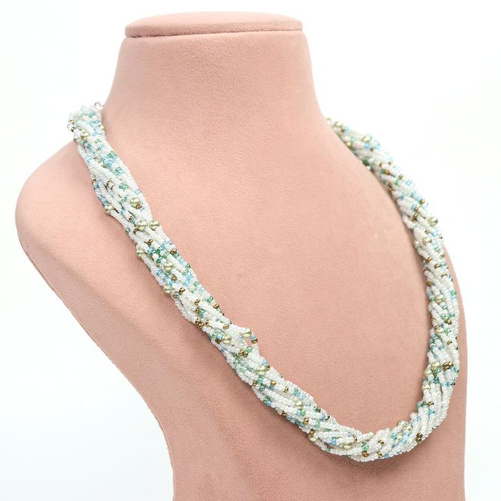 Delemon high-quality twisted multi-strand white bead necklace with blue and gold accents.