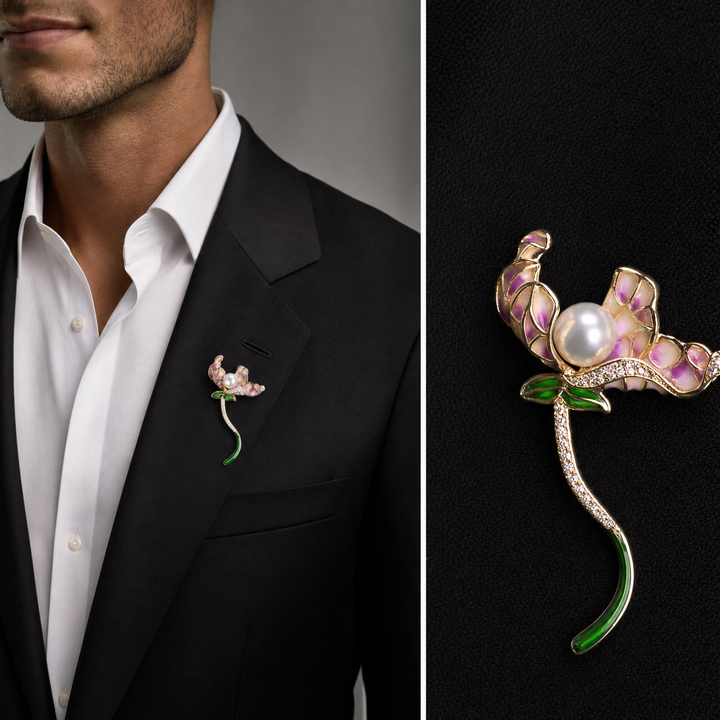 Gold-tone orchid brooch pin featuring purple gradient enamel petals, a large center pearl, and a curved green stem 