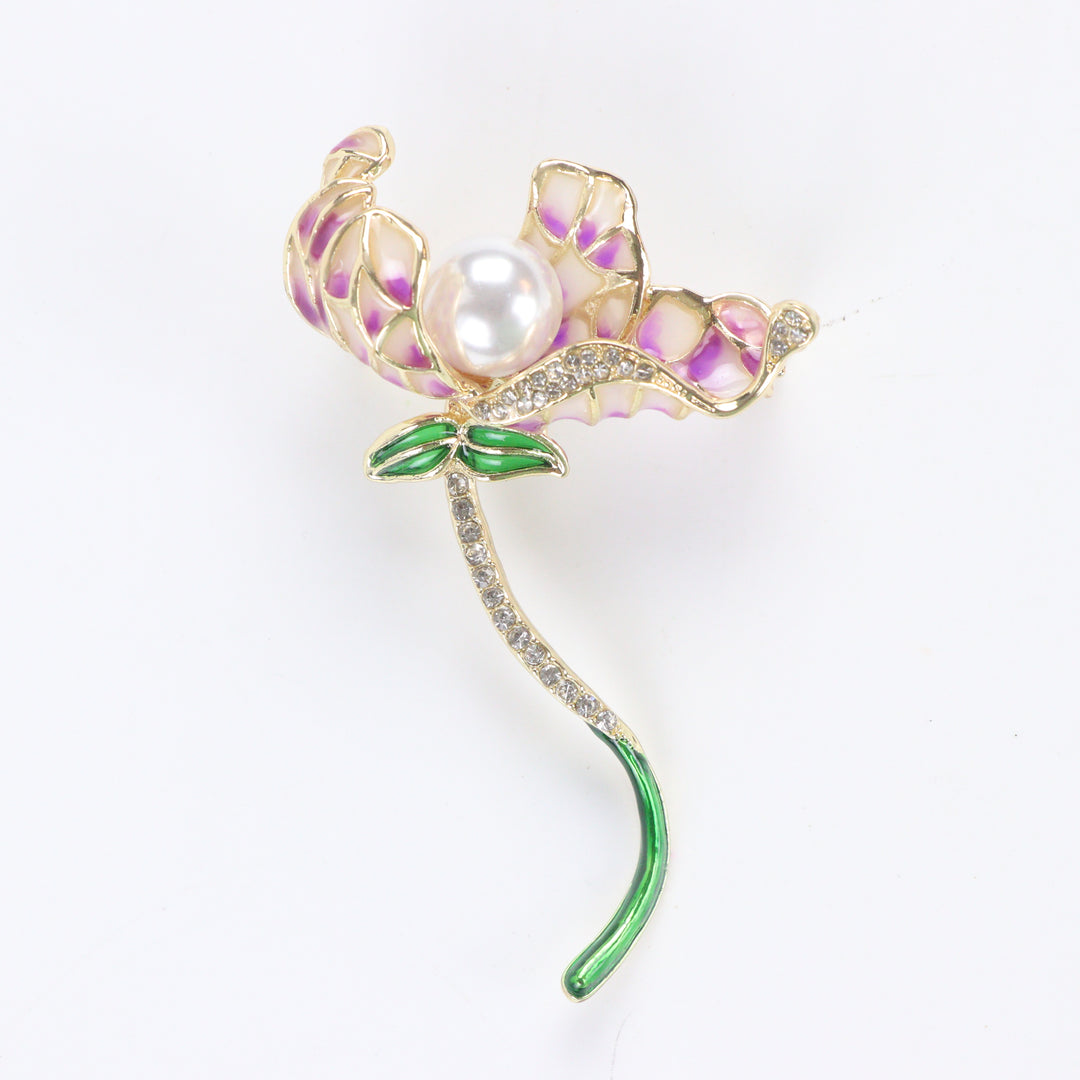 Gold-tone orchid brooch pin featuring purple gradient enamel petals, a large center pearl, and a curved green stem with rhinestones on a white background by Delemon