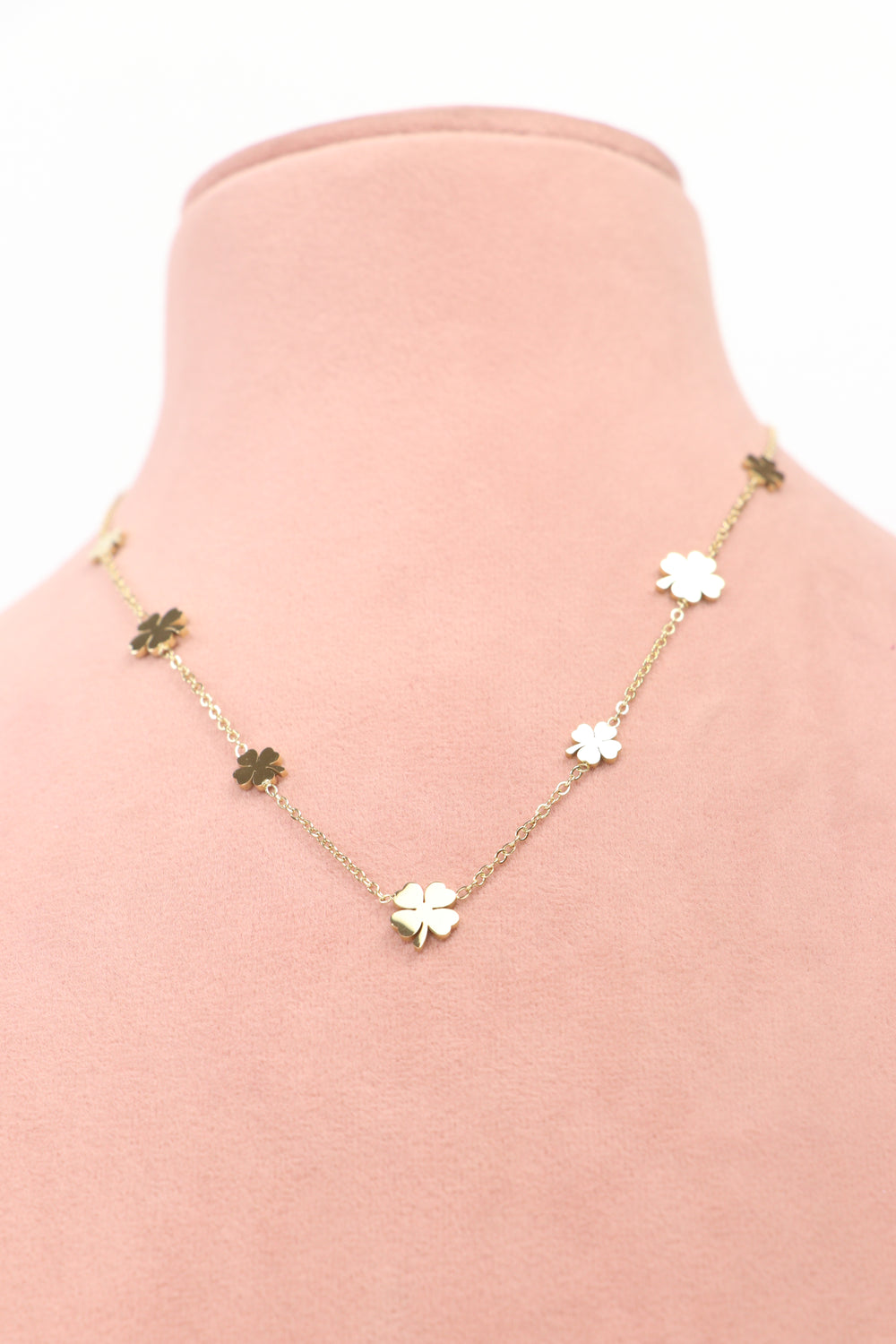 Delemon high-quality gold plated chain necklace featuring multiple delicate clover charms front view.