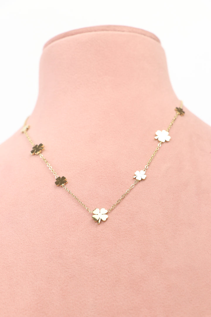 Delemon high-quality gold plated chain necklace featuring multiple delicate clover charms front view.