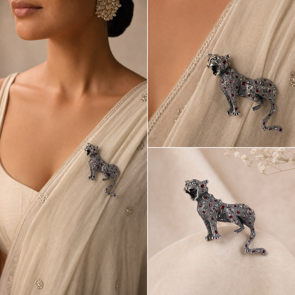 Antique silver-tone stalking leopard brooch pin encrusted with smoky crystals and red enamel leopard spots  by Delemon