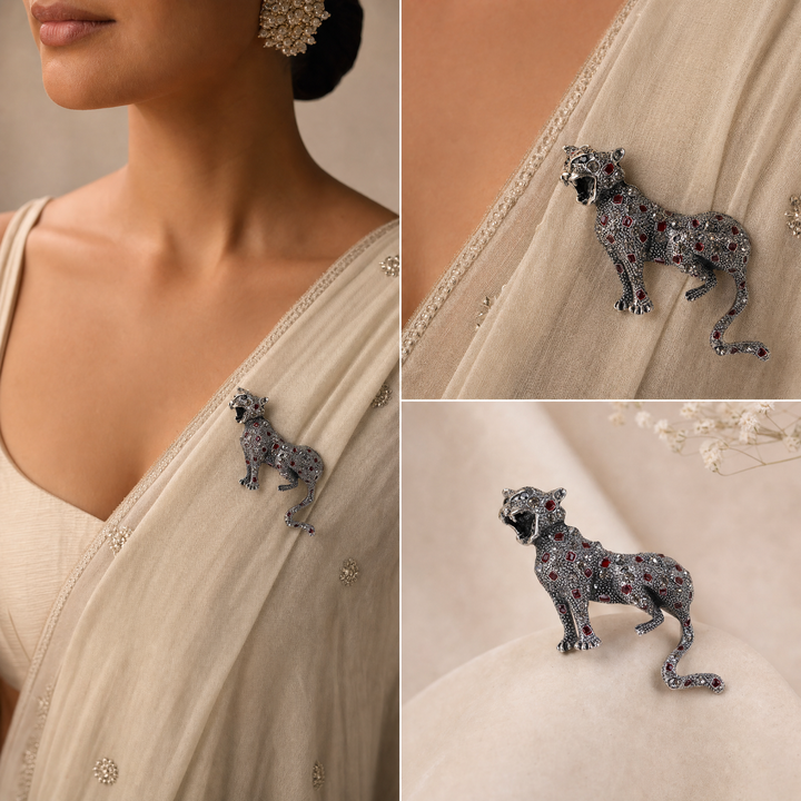 Antique silver-tone stalking leopard brooch pin encrusted with smoky crystals and red enamel leopard spots  by Delemon
