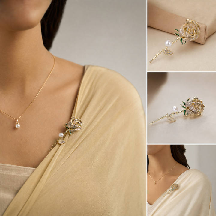 Gold rose brooch pin encrusted with pave crystals, green enamel accents, and a pearl 
