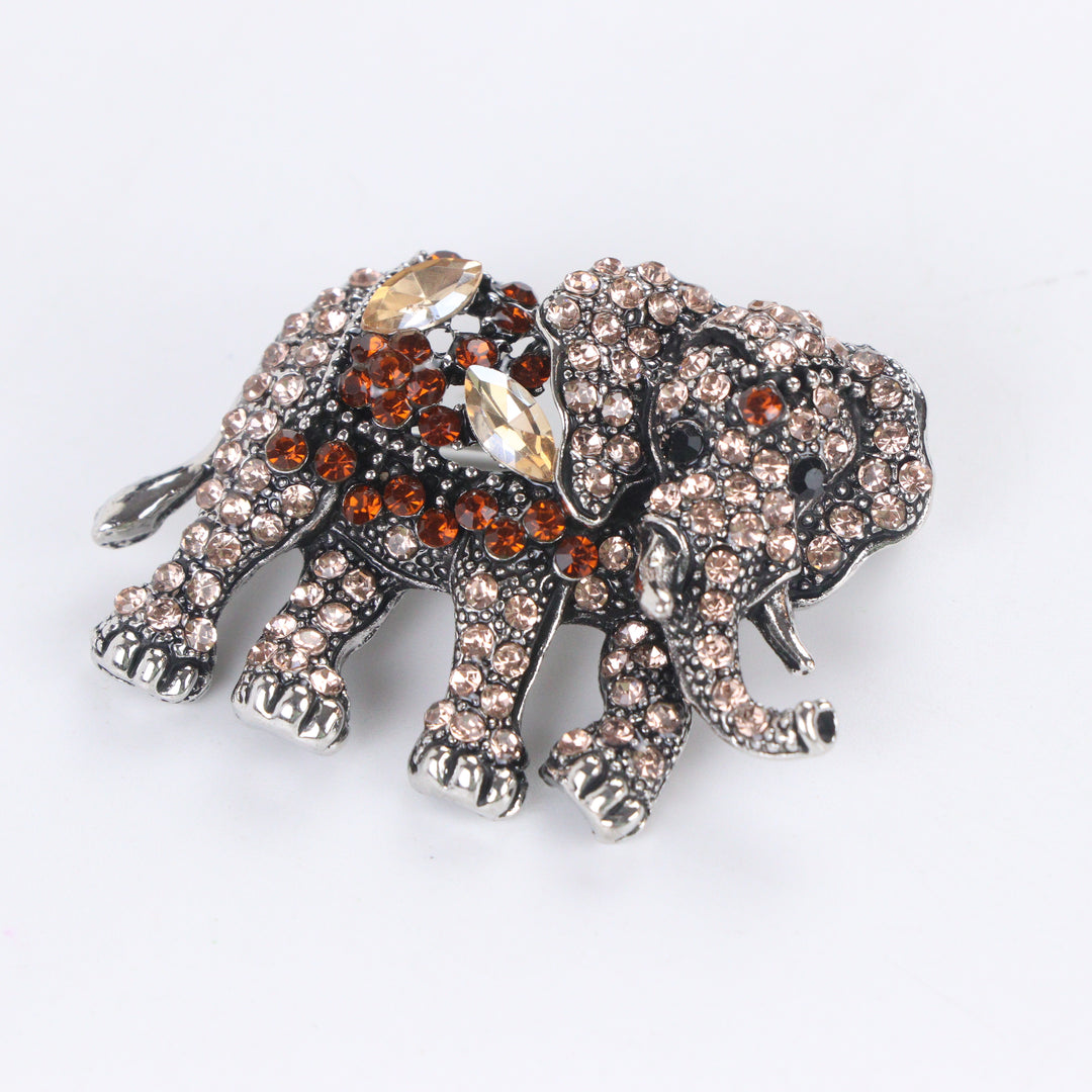 Antique silver-tone elephant brooch pin fully pavé-set with champagne and topaz brown crystals 