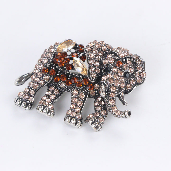 Antique silver-tone elephant brooch pin fully pavé-set with champagne and topaz brown crystals 
