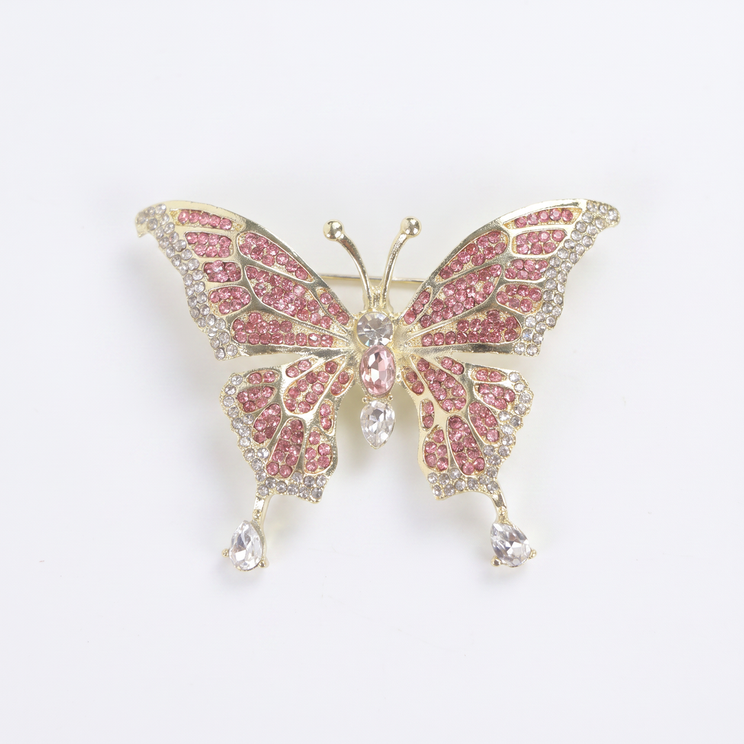 Sparkling gold butterfly brooch pin embellished with pink and clear crystals 