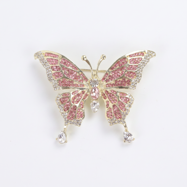 Sparkling gold butterfly brooch pin embellished with pink and clear crystals 