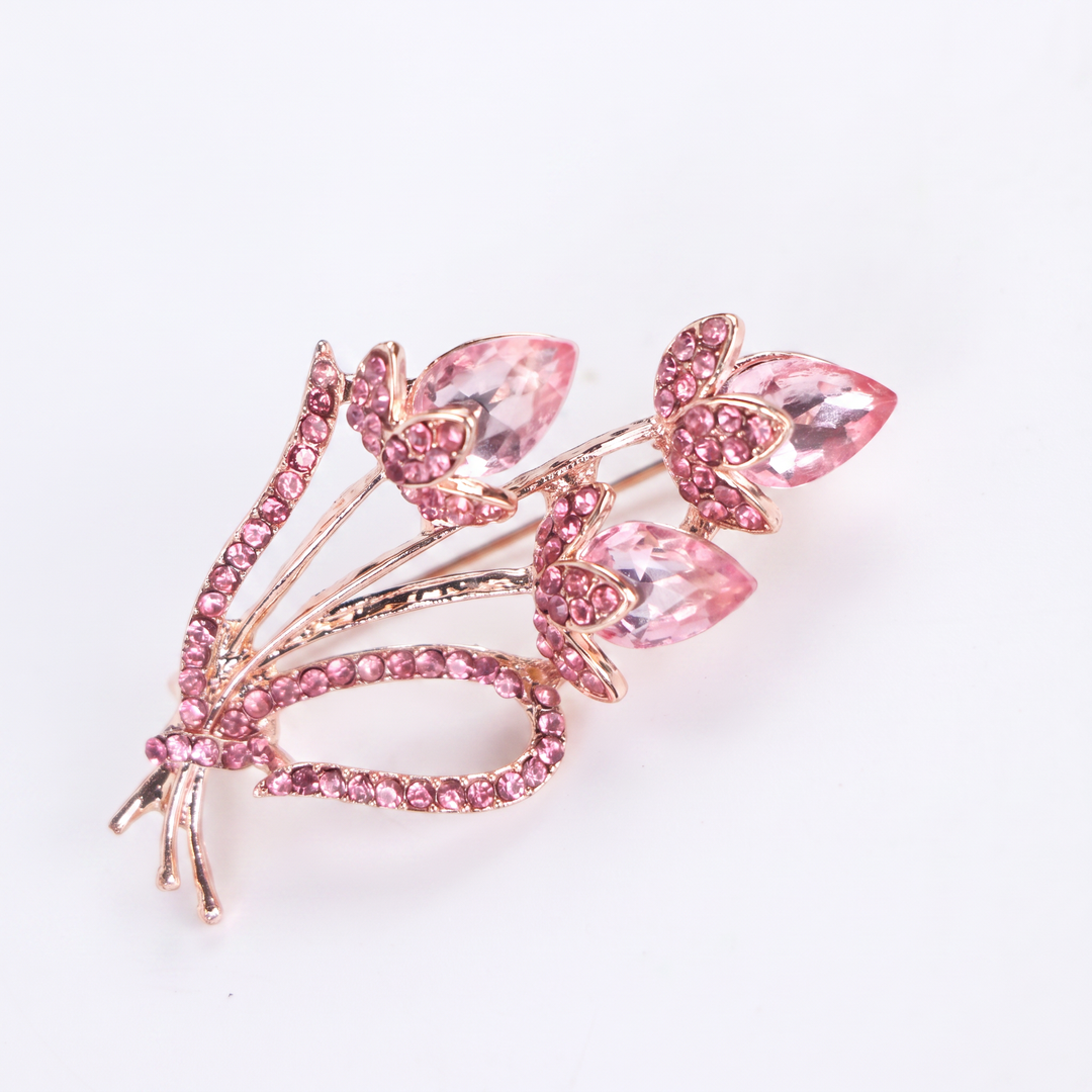 Rose gold-tone tulip bouquet brooch pin featuring faceted pink crystal gems and pink pave rhinestones 