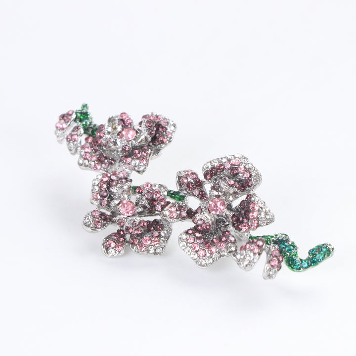 Silver-tone orchid branch brooch pin pavé-set with purple and pink crystals with emerald green crystal stems