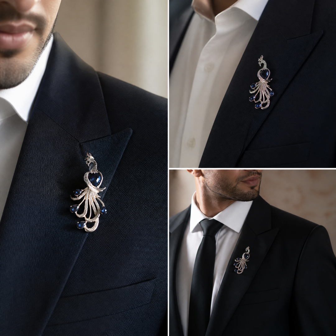 Majestic peacock brooch pin with clear pavé crystals and deep blue teardrop gems