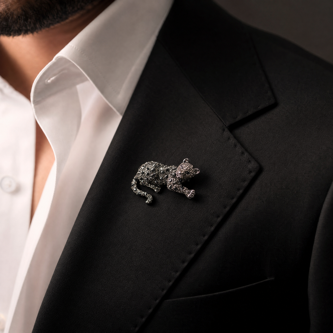Gunmetal-tone crouching panther brooch pin fully pavé-set with dark hematite and smoky crystals