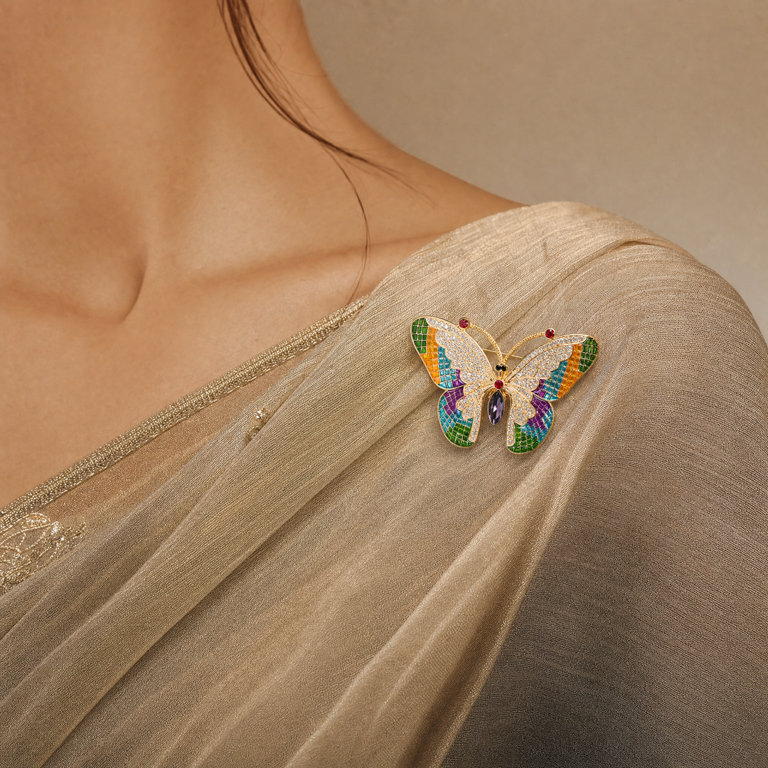 Colorful stained-glass style butterfly brooch pin with clear crystals and a purple marquise center stone