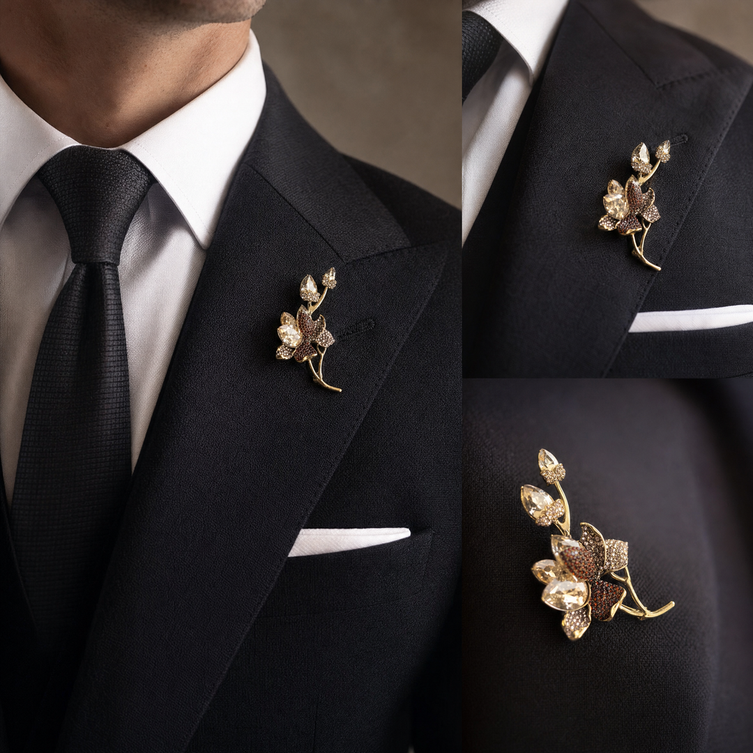 Antiqued gold-tone floral branch brooch pin featuring champagne crystals, topaz rhinestones, and crystal buds 