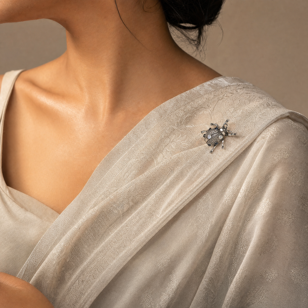 Antiqued silver-tone beetle brooch pin pavé-set with smoky rhinestones, blue crystals,